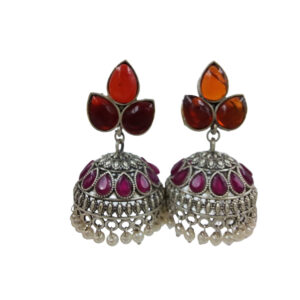 Oxidized Brass Jhumka Earrings with Red Gemstones and Pearl Detailing
