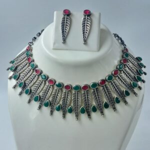 Traditional Oxidized Brass Feather Necklace Set with Red and Green Stones