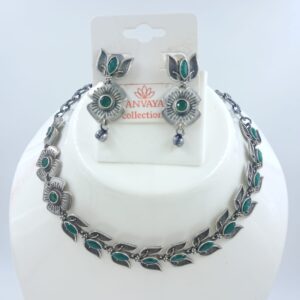 Elegant Oxidized Brass Necklace Set with Green Stones and Earrings.