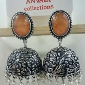 Elegant Oxidized Brass Jhumka Earrings with Orange Stone Studs and Pearl Dangling Detailing