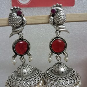 Anvaya Collections Elegant Oxidized Silver Jhumka Earrings with Red Stone and Pearl Detailing